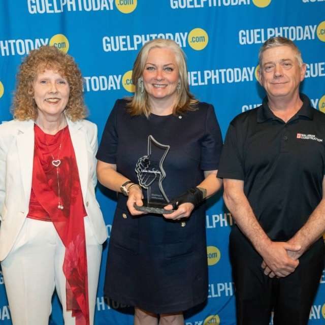 Malamar team receiving a Guelph community award