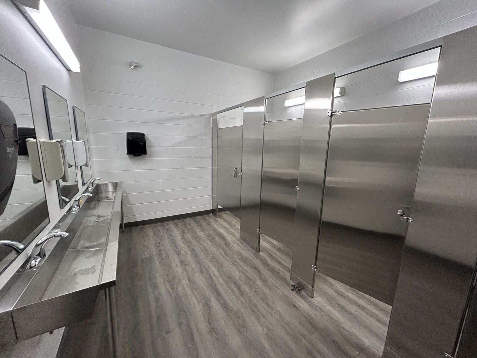 Commercial washroom with a multi-station sink counter