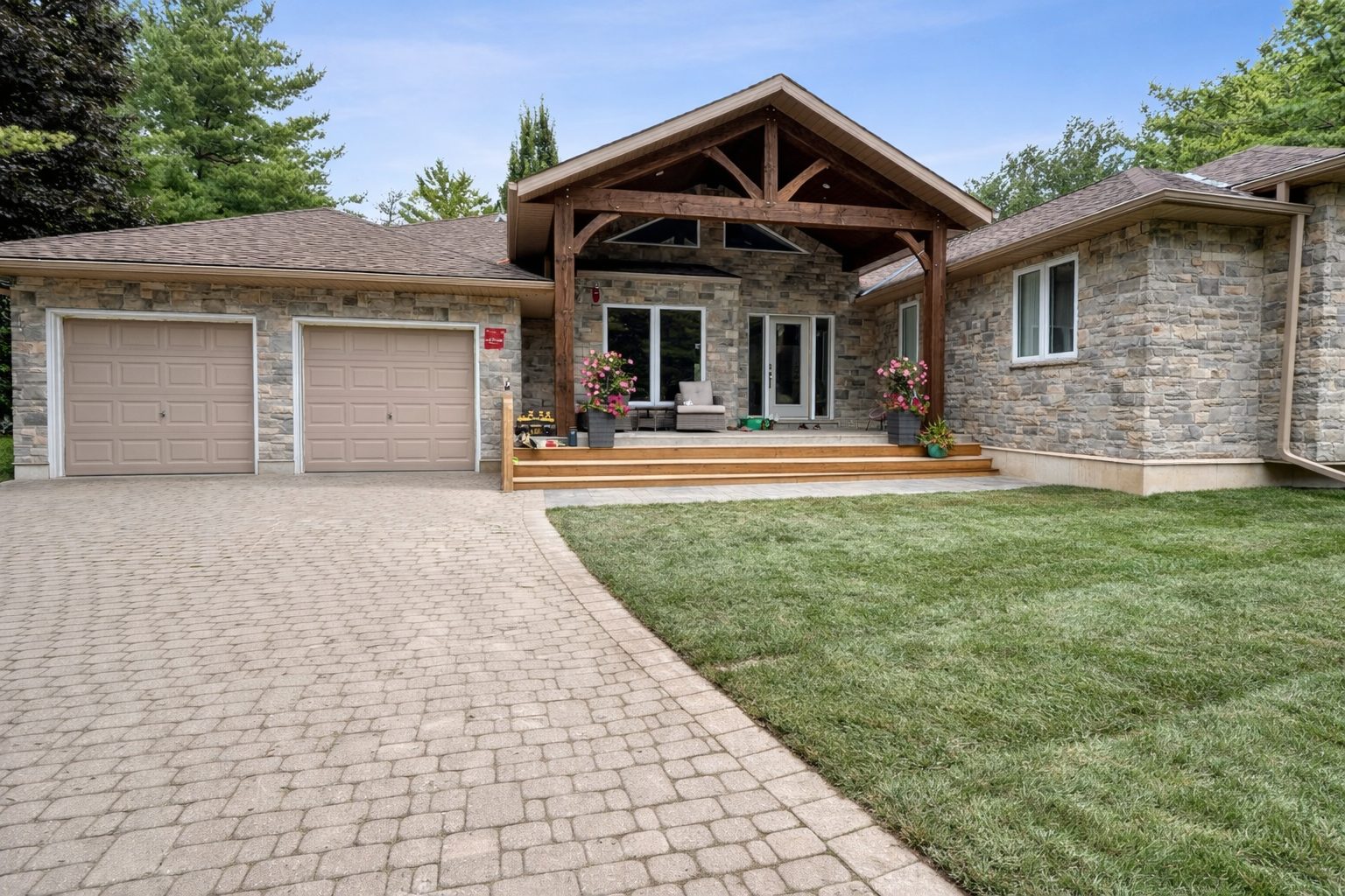 Completed beige two-storey home addition