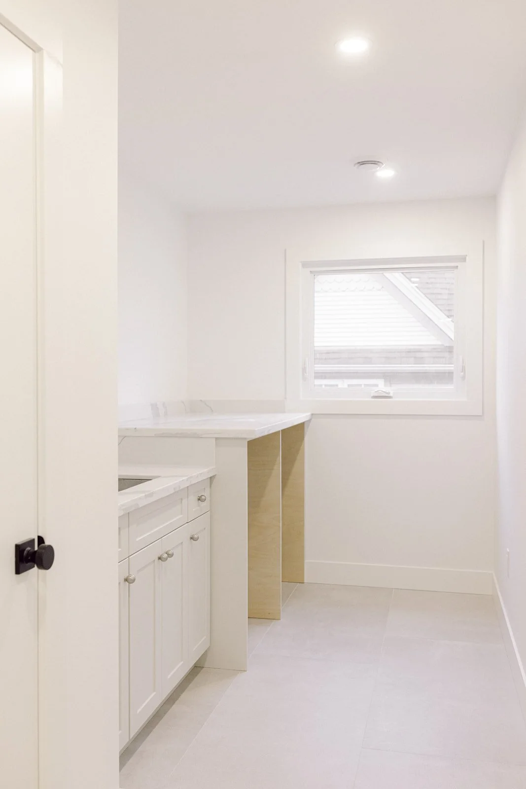 Kitchen with wood shelving and range